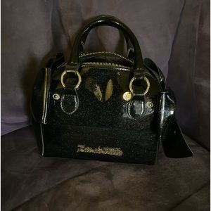 Lux Deville sparkle bow handbag